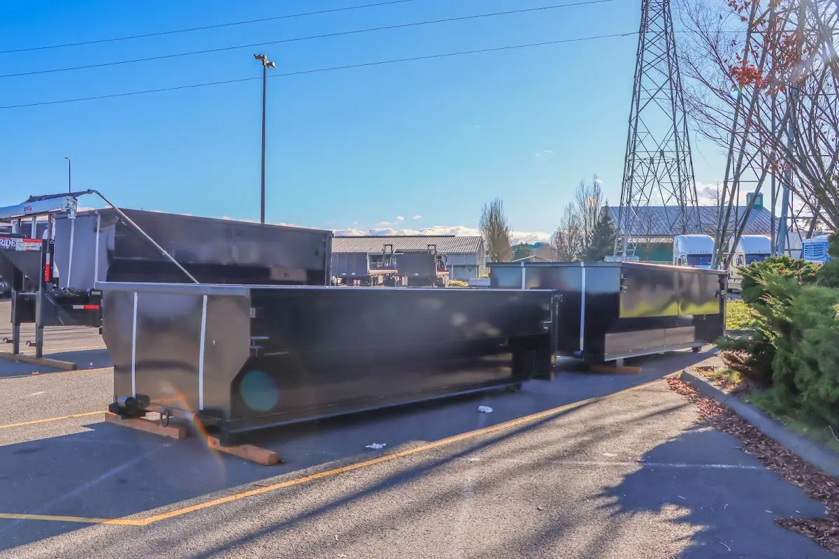 Roll-off dumpster ready for waste disposal at job site for Roofing Dumpster Rental in Osceola